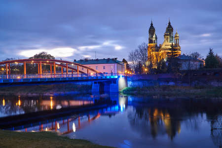 Urban landscape with river Warta and the cathedral towers in spring in Poznanの写真素材