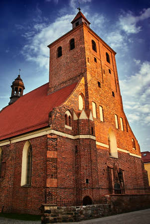 gothic medieval Catholic Church with belfry of in Grudziadzの写真素材