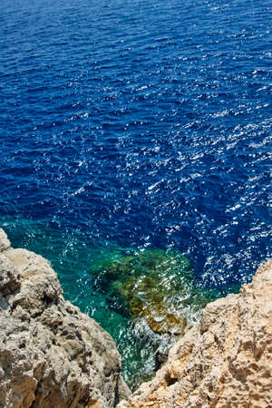 rocky cliff on the seacoast island of Rhodesの写真素材