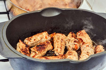 pork slips fried in roasting pan - traditional Polish dishの写真素材