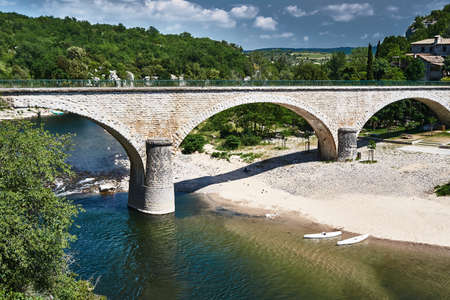 Stone bridge over the River Ardeche in Franceの写真素材
