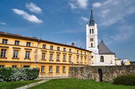 A historic church with a bell tower in the city of Vidnava in the Czech Republicの写真素材