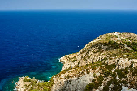 Rocky coast of the Greek island of Rhodes in the Mediterraneanの写真素材