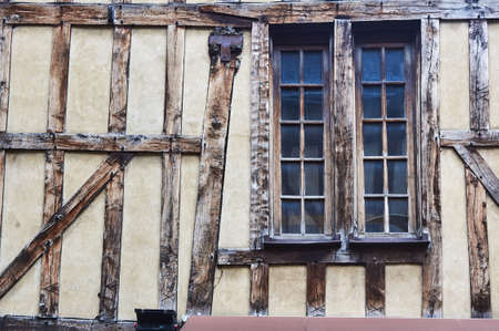 windows in a medieval half-timbered building in Troyes