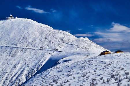 modern hut on the top in the Giant Mountains in winterの写真素材