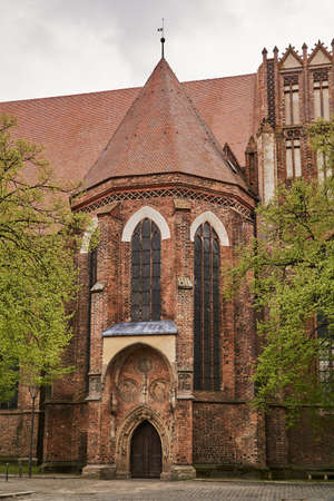 Portal and wooden doors of a medieval church in the city of Frankfurt (Oder)