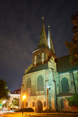 Historic, Gothic St. Nicholas Church during the night in Berlinのeditorial素材