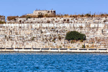Stone Wall of Venetian fortifications, the medieval fortress city of Kos in Greeceの写真素材