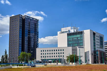 Metal and glass facades of modern buildings in the city of Poznanの写真素材