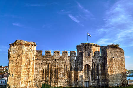Tower and walls of Venetian fortress in the town of Trogir in Croatiaの写真素材