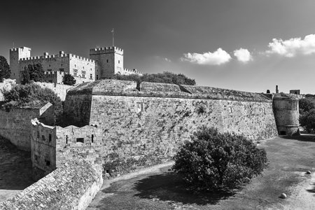 The walls and turrets of the medieval castle of the Joannite Order in the city of Rhodes, black and whiteのeditorial素材