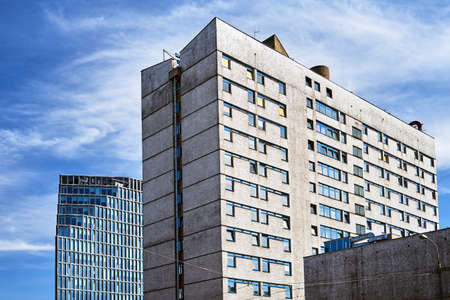 Concrete and glass facades of modern buildings in Poznan city