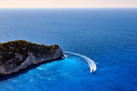 Motorboat on the rocky peninsula of Zakynthos, Greeceの写真素材