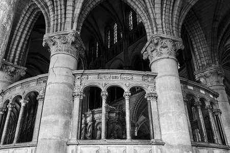Stone tomb inside the Romanesque Basilica of St. Remigius in Reims, France, monochromeの写真素材