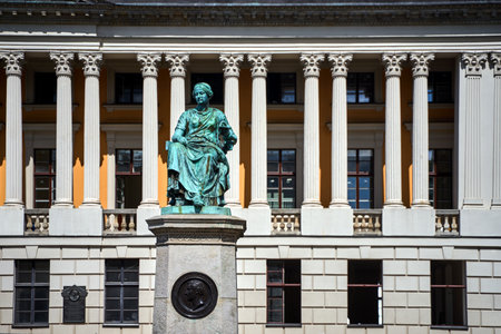 The historic statue of a woman against the background of the colonnade of a historic building in PoznaÅのeditorial素材