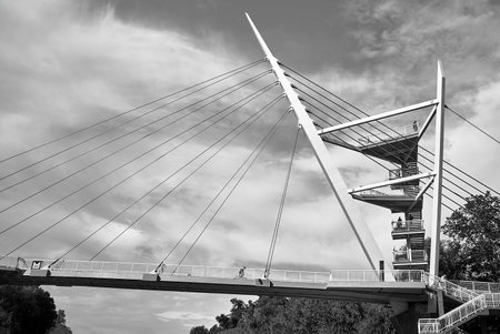 Viewing platforms on the cable-stayed bridge over the Warta River in Owinska, Poland, monochrome