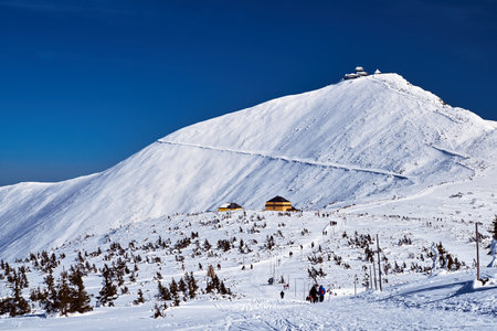 People and tourist hostel on top of Sniezka in the Giant Mountains, Poland