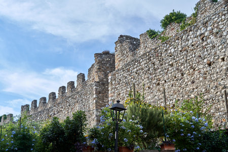 The stone ramparts of the medieval Padenghe Castle on Lake Garda, Italyの写真素材