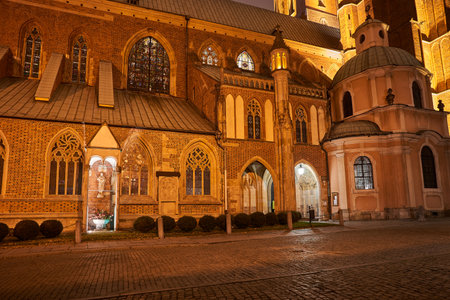 gothic cathedral St. John the Baptist Cathedral at night in Wroclaw, Polandの写真素材