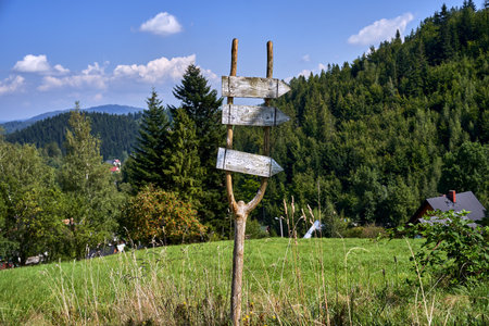 glade with Wooden signposts on a tourist trail in the Beskidy Mountains, Polandの写真素材