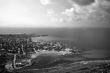 The sea and the beach from a bird's eye view in Stavros on the island of Crete, Greece, monochromeの写真素材