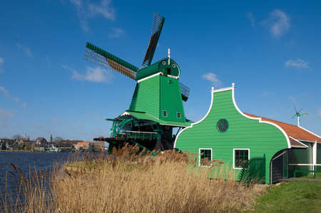 Green wooden windmill in Zaanse Schans, the Netherlandsのeditorial素材
