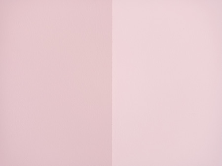 Light pink texture of the plaster of two delicate modern shades of pink.の写真素材
