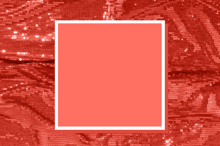 Trend photography on the theme of the color of the year 2019 - Living Coral. Large shiny glossy sequins fully filling the background space.の写真素材