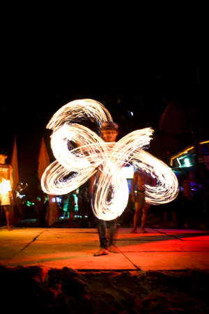 PHI PHI ISLAND, KRABI,THAILAND-MARCH 10,2020 : Amazing Fire Show at night on Phi Phi Island in Krabi Thailand.のeditorial素材