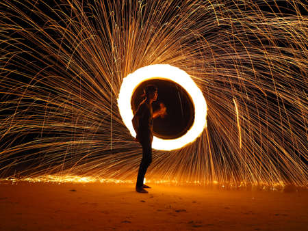 PHI PHI ISLAND, KRABI,THAILAND-MARCH 10,2020 : Amazing Fire Show at night on Phi Phi Island in Krabi Thailand.のeditorial素材