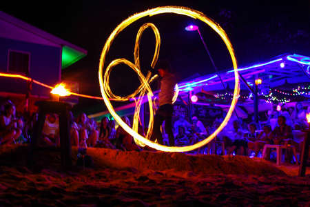 PHI PHI ISLAND, KRABI,THAILAND-MARCH 10,2020 : Amazing Fire Show at night on Phi Phi Island in Krabi Thailand.のeditorial素材