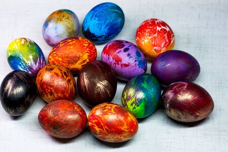 Painted in different colors Easter eggs on a white backgroundの写真素材
