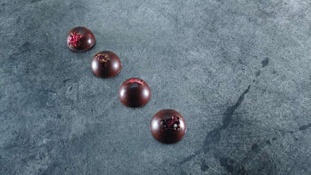 Artisan handmade chocolate. Chocolate bars with dried fruitの写真素材