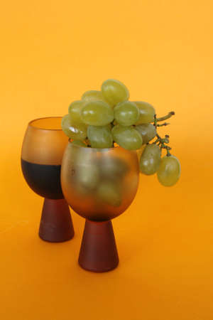 Two golbets in isolated on yellowの写真素材