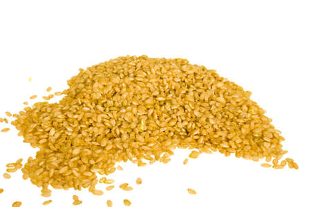 Dry integral rice in isolated over whiteの写真素材