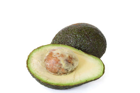 Ripe avacado-whole and half in isolated over whiteの写真素材
