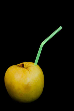Fresh apple juice isolated on a black background の写真素材