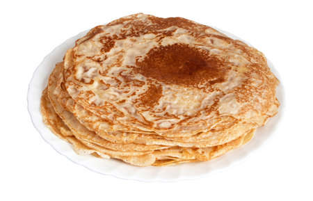 Fresh pancakes on white plate over white background