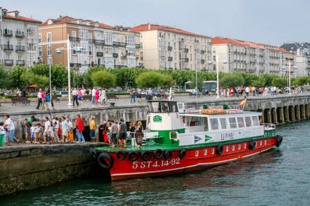 Santander, Spain - August 15: passengers get off the cutter on the embankment in Santander - on August 15, 2009 in Santander, Cantabria, Spainのeditorial素材