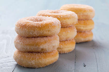 Fresh donut on blue tableの写真素材