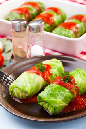 cabbage stuffed with rice and meat on plateの写真素材