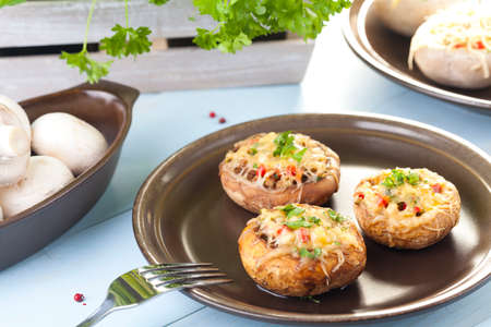 Baked stuffed mushrooms with cheeseの写真素材