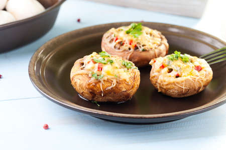 Baked stuffed mushrooms with cheeseの写真素材