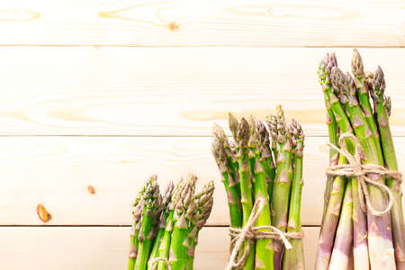 Fresh asparagus  on a wood boardの写真素材