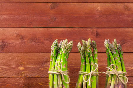 Fresh asparagus  on a wood boardの写真素材
