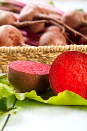 Fresh beets on a wooden board