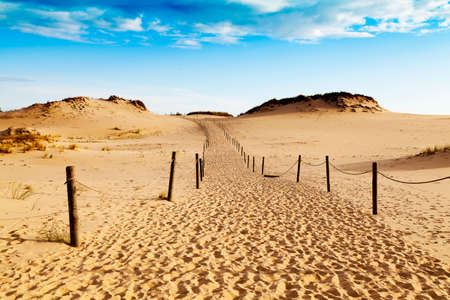Sand dunes on the Baltic coast in the morning - storm cloudsの写真素材