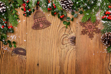 Winter background with natural green plants and xmas decorationの写真素材