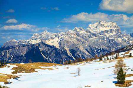The snow-covered peaks of the Dolomites in early spring.の写真素材