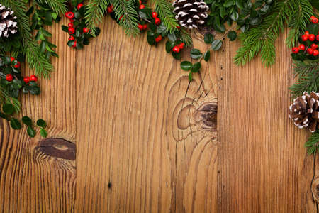 Winter background with natural green plants and xmas decorationの写真素材